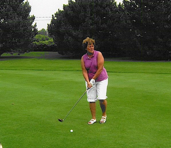 Gerry Moultine gets ready to hit her approach into #8. 